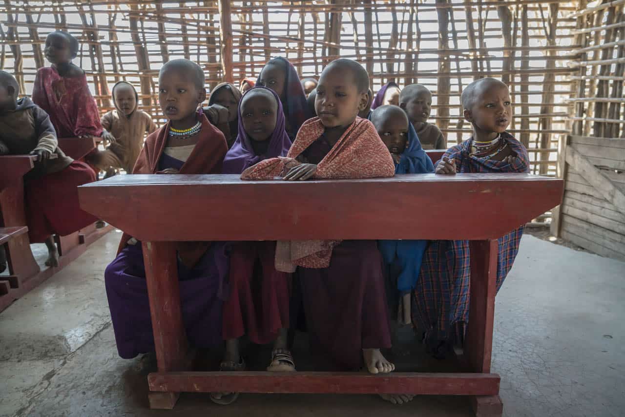 Maasai school visit children at desk
